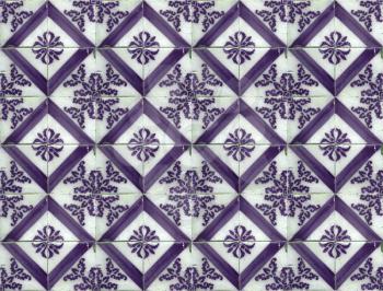Photograph of traditional portuguese tiles in purple colours