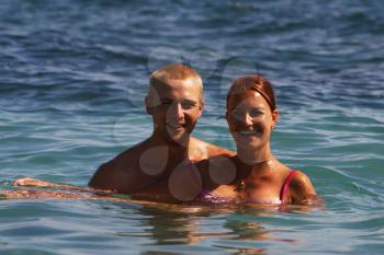 Royalty Free Photo of a Couple Swimming