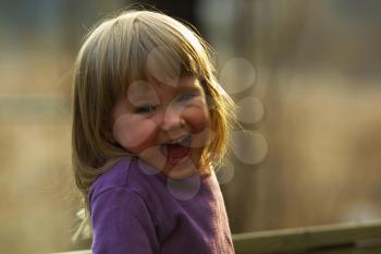 Royalty Free Photo of a Laughing Little Girl