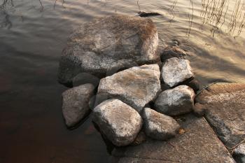 Royalty Free Photo of Rocks in a Pond