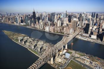 Royalty Free Photo of an Aerial View of Queensboro Bridge in New York City With Rooseveldt Island and  Manhattan Cityscape 