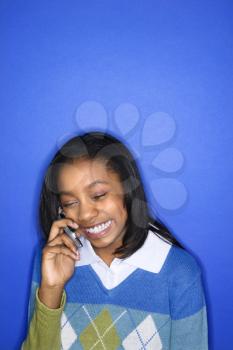 Royalty Free Photo of a Teenage Girl Talking on a Cellphone