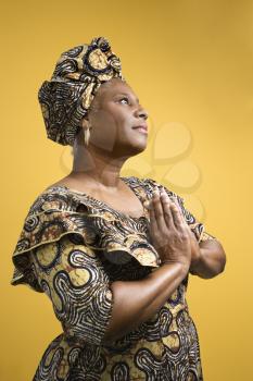 Royalty Free Photo of an African American Woman Dressed in African Costume