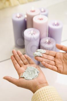 Royalty Free Photo of Woman's Hands With Facial Scrub