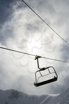 Royalty Free Photo of an Empty Chair Lift at a Ski Resort