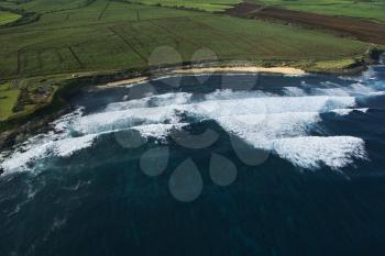 Royalty Free Photo of an Aerial of a Surf Spot on the Coast of Maui, Hawaii With Waves