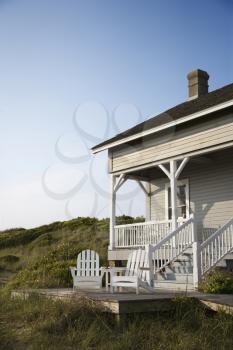 Royalty Free Photo of a Coastal House With a Porch and Deck on Bald Head Island, North Carolina