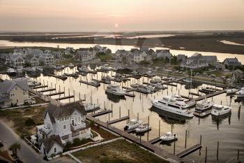 Royalty Free Photo of an Aerial View of a Coastal Village With Marina on Bald Head Island, North Carolina