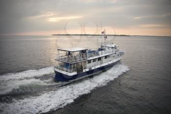 Passenger ferry crossing sea at Bald Head Island, North Carolina. 