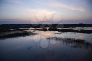Royalty Free Photo of the Sky Reflecting in Marsh Water on Bald Head Island, North Carolina