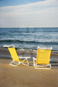 Royalty Free Photo of Empty Lounge Chairs on a Beach on Bald Head Island, North Carolina
