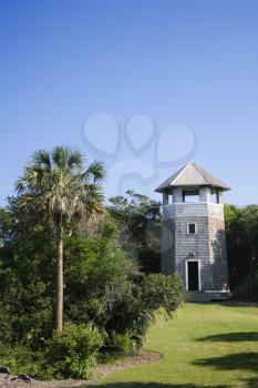Royalty Free Photo of a Lighthouse Shaped Building on Bald Head Island, North Carolina
