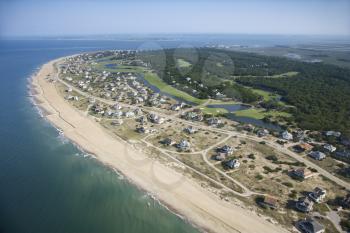Royalty Free Photo of Aerial View of a Beach and Residential Neighborhood at Bald Head Island, North Carolina