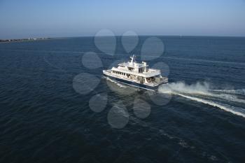 Royalty Free Photo of an Aerial View of a Passenger Ferry Boat in Open Water Near Bald Head Island, North Carolina