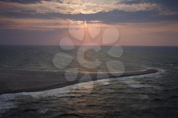 Royalty Free Photo of a Bald Head Island North Carolina Landscape of a Shoreline During Sunrise