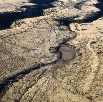 Royalty Free Photo of an Aerial View of an Arizona Desert Landscape With a Small Water Source
