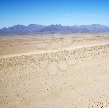 Royalty Free Photo of an Aerial View of a Remote California Desert With the Mountain Range in the Background