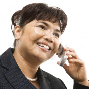 Royalty Free Photo of a Filipino Businesswoman Talking on a Cellphone 