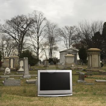 Royalty Free Photo of a Flat Panel Television Set in a Cemetery