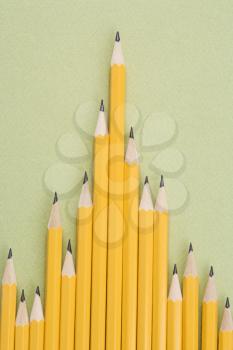 Royalty Free Photo of Sharp Pencils Arranged in an Uneven Row
