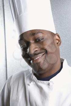 Royalty Free Photo of a Chef Wearing a Uniform