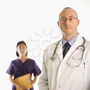 Royalty Free Photo of a Physician Standing With a Doctor