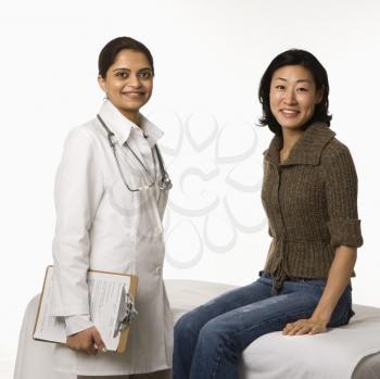 Royalty Free Photo of a Doctor With a Patient