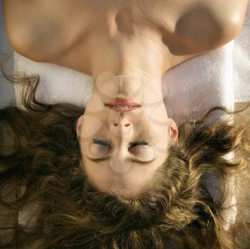 Royalty Free Photo of a Woman Lying Down With Hair Spread Out