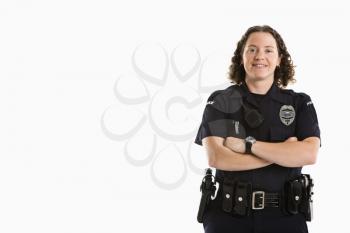 Royalty Free Photo of a Policewoman Standing With Her Arms Crossed