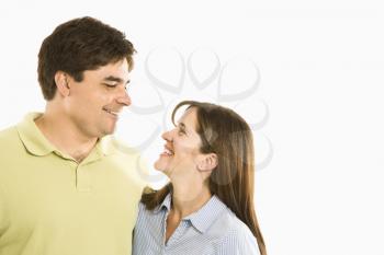 Royalty Free Photo of a Smiling Couple Looking at Each Other