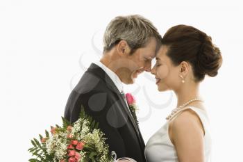 Royalty Free Photo of a Groom and a Bride Embracing