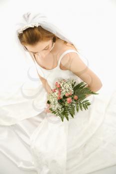 Royalty Free Photo of Bride Holding a Bouquet