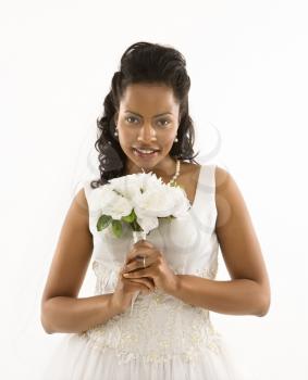 Royalty Free Photo of an African American Bride Holding a Bouquet 