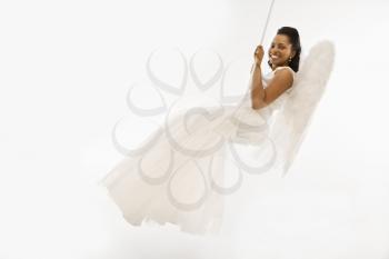 Royalty Free Photo of an Angelic African-American Bride Swinging