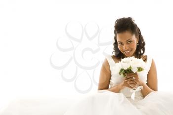 Royalty Free Photo of an African-American Bride Holding a Bouquet 