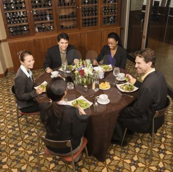 Royalty Free Photo of a Group of Businesspeople in a Restaurant Eating