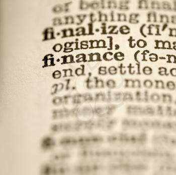 Royalty Free Photo of a Dictionary Close-Up of the Word Finance