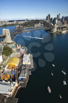 Royalty Free Photo of Luna Park Sydney, Australia With Boats in the Harbour and View of Sydney Harbour Bridge