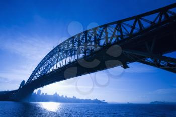Royalty Free Photo of Sydney Harbour Bridge at Dusk With Distant Sydney Skyline, Australia