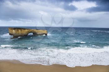 Royalty Free Photo of a Rock Formation in an Arch Shape as Seen From Great Ocean Road in Australia