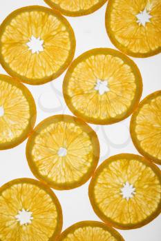 Royalty Free Photo of Orange Slices Arranged in a Design