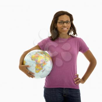 Royalty Free Photo of a Woman Holding a Globe on Hip Smiling