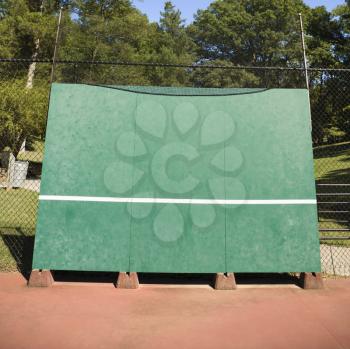 Royalty Free Photo of a Tennis Backboard For Single Practice in a Park