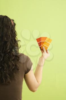 Royalty Free Photo of a Woman Holding Paint Swatches
