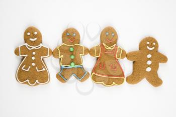 Gingerbread  cookies holding hands.