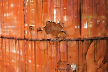 Royalty Free Photo of a Close-up of a Metal Orange Container