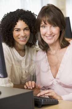 Royalty Free Photo of Two Women at a Computer