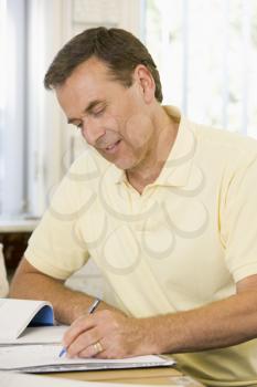 Royalty Free Photo of a Man Taking Notes