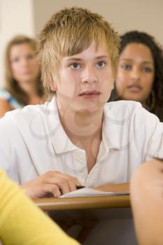 Royalty Free Photo of a Student Listening in Class