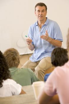 Royalty Free Photo of a Teacher Giving a Lecture